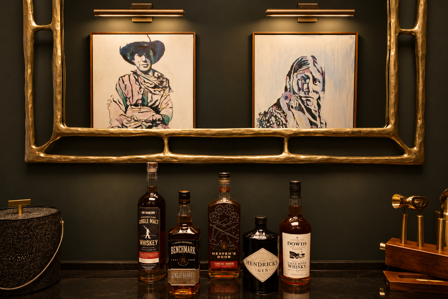 A moody bar vignette with framed portrait art, a sculptural brass mirror and curated spirits