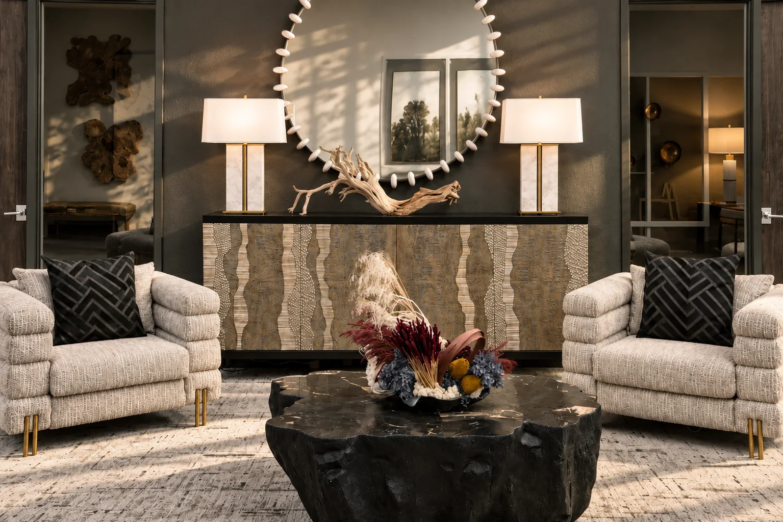 A living room centered on a mirrored fireplace with symmetrical seating